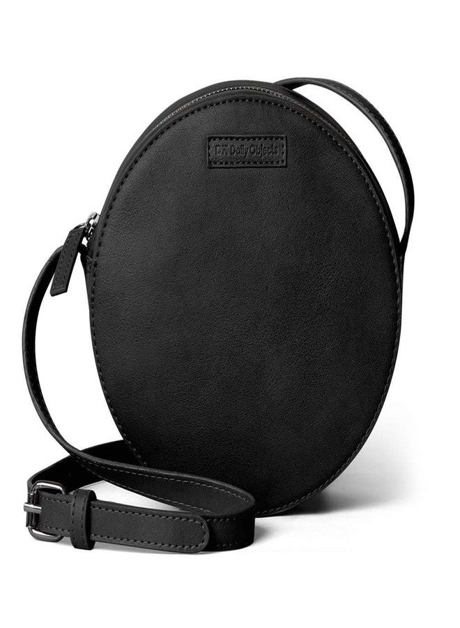DailyObjects Orbis Round Sling Crossbody Bag For Women| Stylish Solid Black Faux Leather Purse With Slip Pocket & 2 Compartments Inside| Zip Closure & Adjustable Strap| Storage Space For Essentials - Image 1
